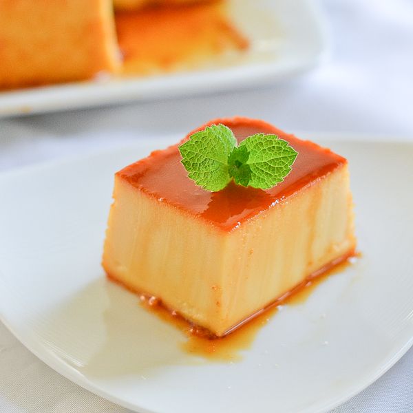 Slice of Leche Flan on a plate Slice of Leche Flan on a plate